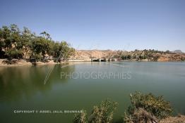 Image du Maroc Professionnelle de  Le Barrage Machraa Hamadi dont la capacité est de 42 Millions de m3, est construit sur l'Oued Moulouya, il permet, depuis 1956, d'approvisionner la région et d'irriguer les terres de cultures, ce barrage fournit en eau potable les ville de Nador, Oujda, il permet également l'approvisionnement des centre de Taourirte et El Aïoun Sidi Mellouk. Samedi 1er octobre 2005. (Photo / Abdeljalil Bounhar) 